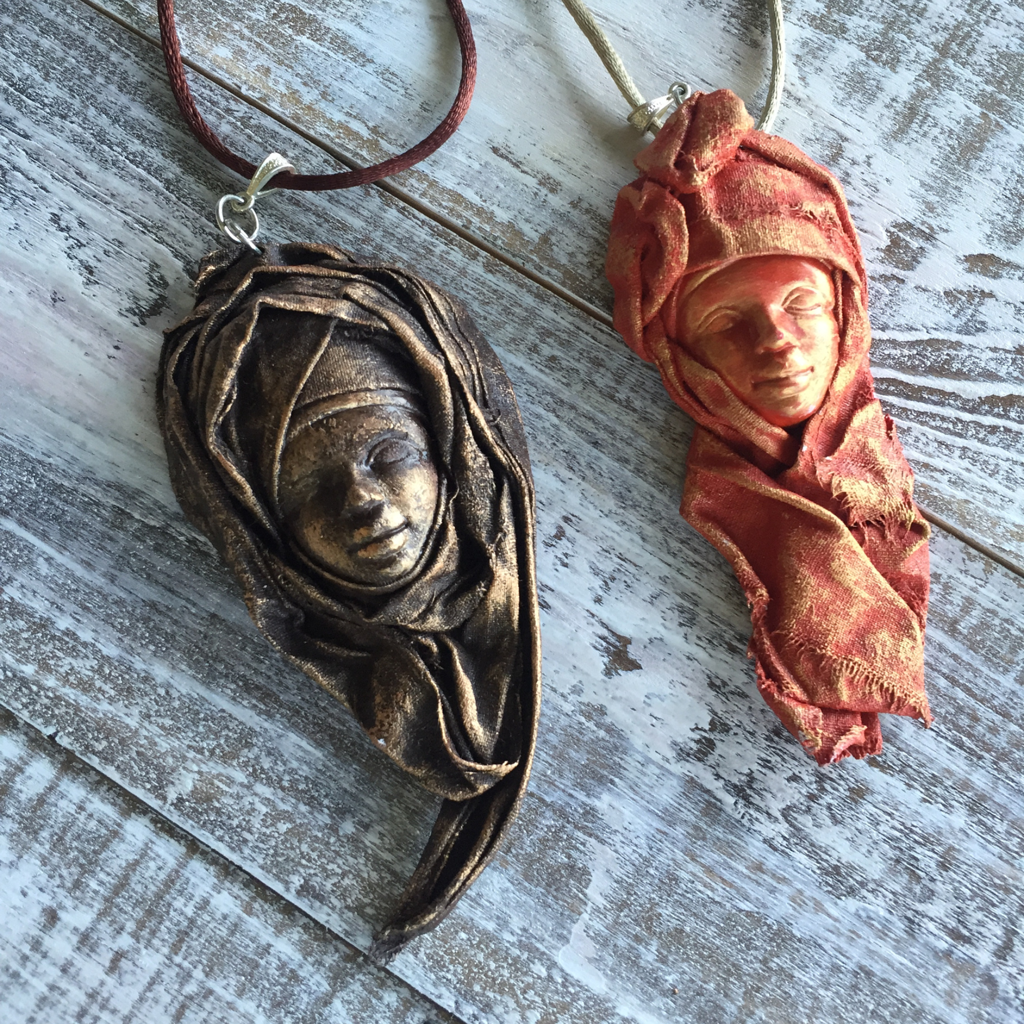 Pictured: Jewelry Pendants incorporating Powertex flat back plaster heads.